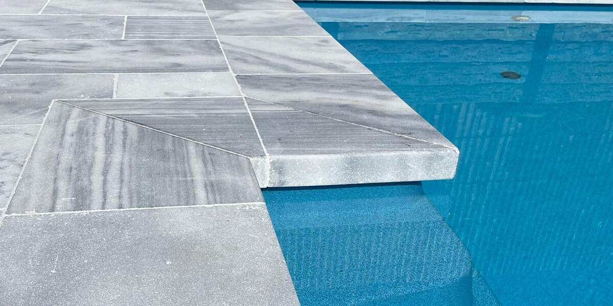 Get Natural Stone Pool Copings In Melbourne